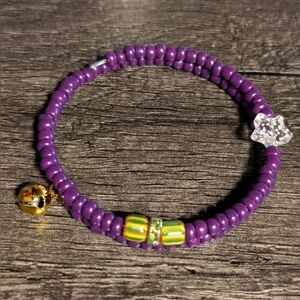 Handcrafted purple beaded memory wire charm bracelet